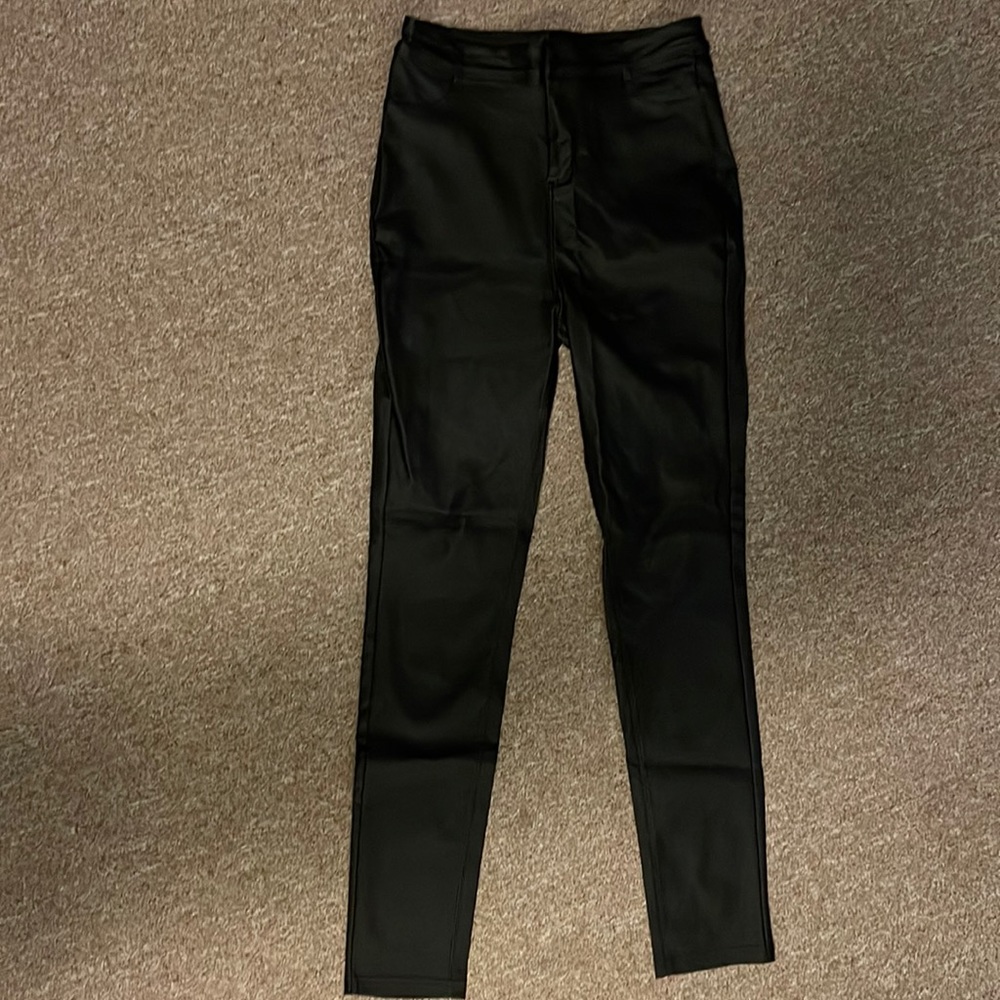 Faux leather black pants. Size Medium.